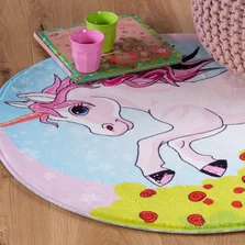 Illustration - Ihr Experte für schönes Wohnen - Ein runder Kinderteppich mit einem Einhornmotiv.